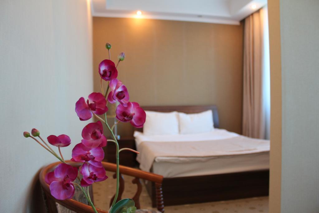 Akbulak Hotel Astana Chambre photo