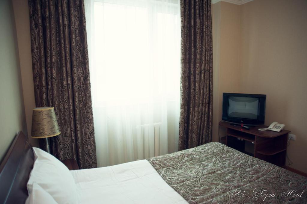 Akbulak Hotel Astana Chambre photo