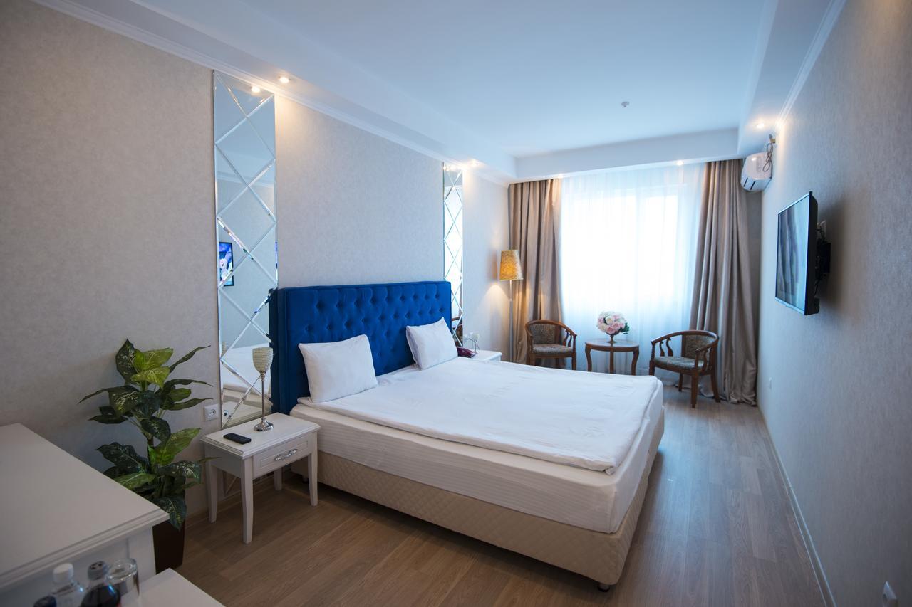 Akbulak Hotel Astana Extérieur photo